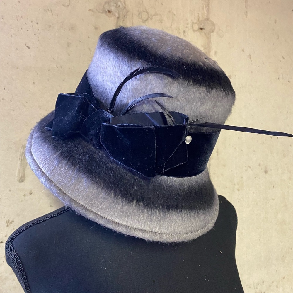 Designer black/grey beaver fur hat with feathers and velvet detailing.